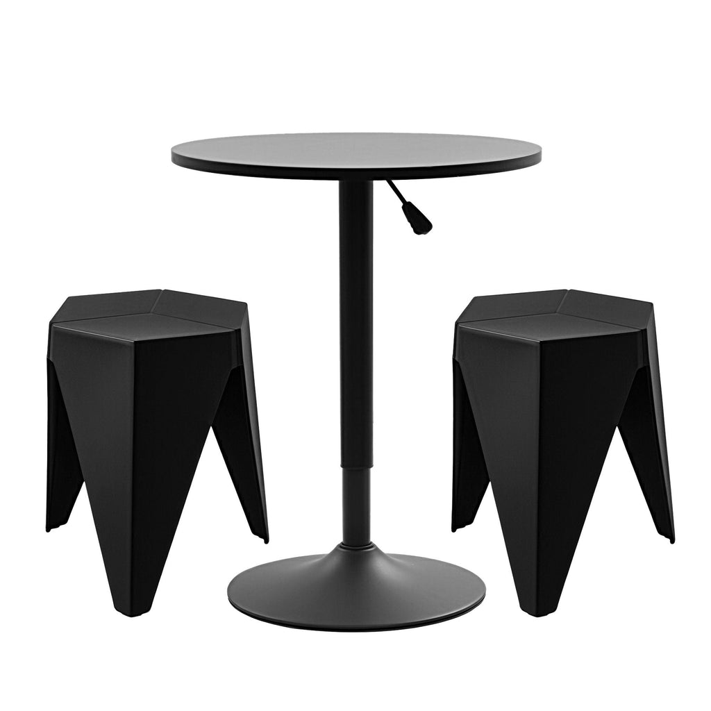 Black round table with two modern stools on a white backgro