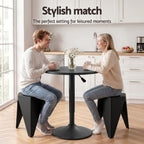 Two people sitting at a black table in a kitchen with the text 'Stylish match' above them.