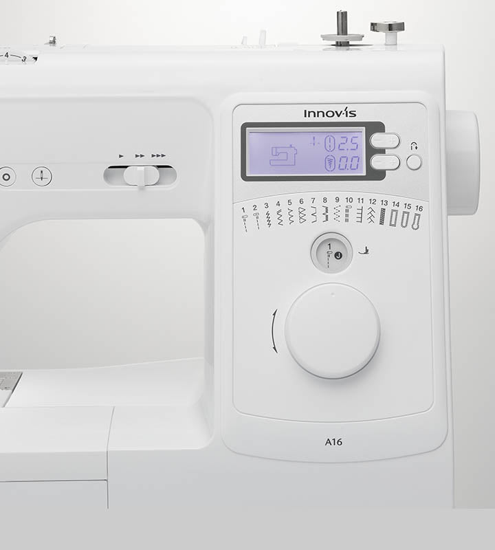 Innovis sewing machine with digital display and control panel on a white background
