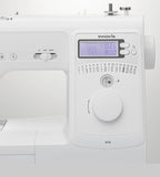 Innovis sewing machine with digital display and control panel on a white background
