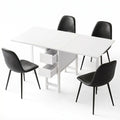 White dining table with four black chairs on a white background