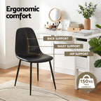 Black chair with ergonomic support features in a home office setting