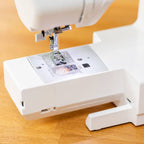 The Elna 350 has a free arm plus a drop in jam proof Bobbin area