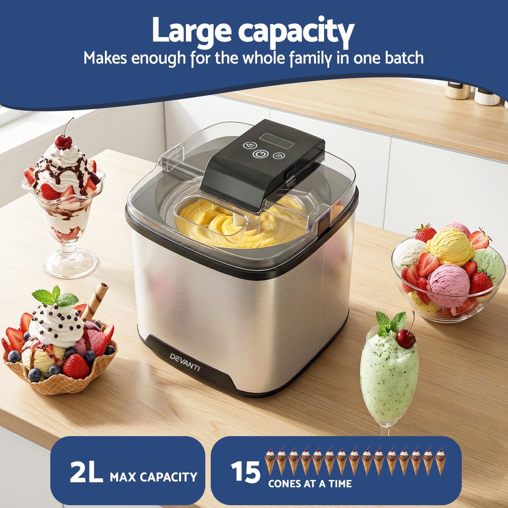 Ice cream maker on a kitchen counter with ice cream and fruit toppings, labeled 'Large capacity' and '2L max capacity'.
