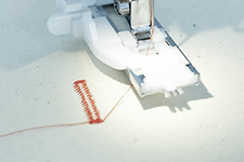 This is the one step buttonhole foot on the new Janome SewSwitch sewing and overlocking machine