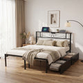 A dark metal bed frame with a decorative headboard and built-in storage drawers underneath, styled with beige bedding and a throw blanket in a bright, modern bedroom.

Details