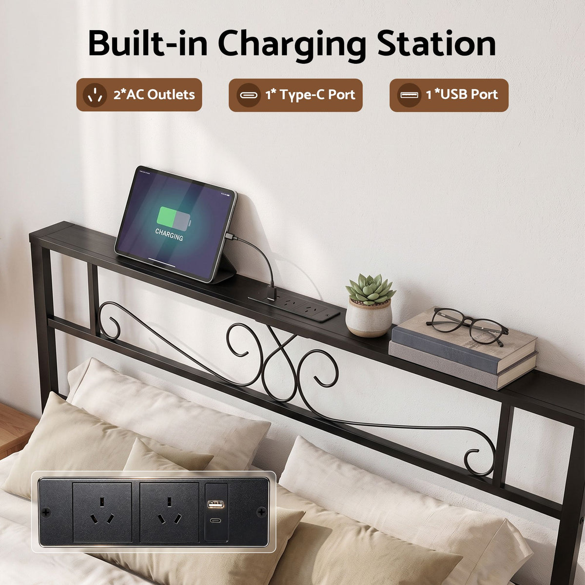 A built-in charging station shown installed in a bed headboard, featuring a black metal frame with an integrated power outlet, AC outlets, a Type-C port, and a USB port. A tablet is charging on the shelf above, with a small plant and books on the bed.