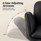 Black armchair with adjustable armrests on a beige background