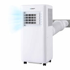 White portable window air conditioner with a visible brand logo 'DEVANTI' on the front, featuring a front vent, side exhaust opening, and a blue graphic indicating airflow, set against a plain white background.