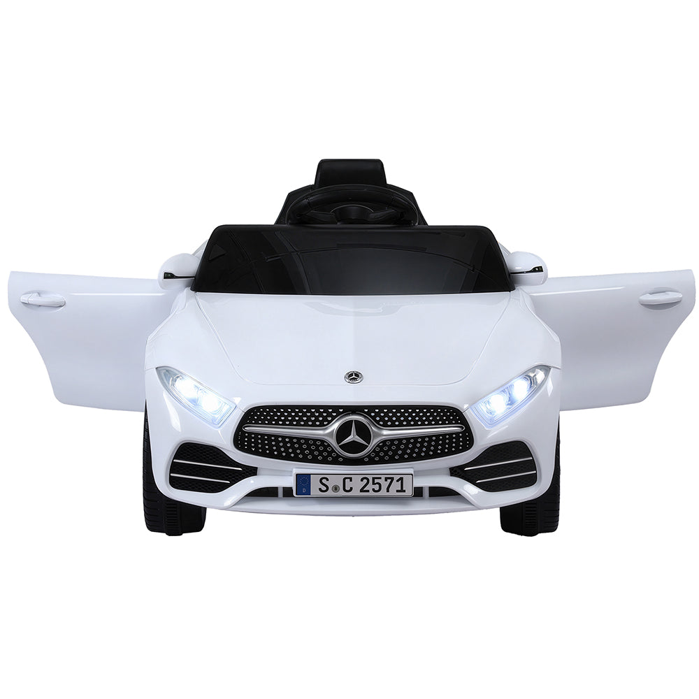 White toy car with Mercedes-Benz logo on a white background