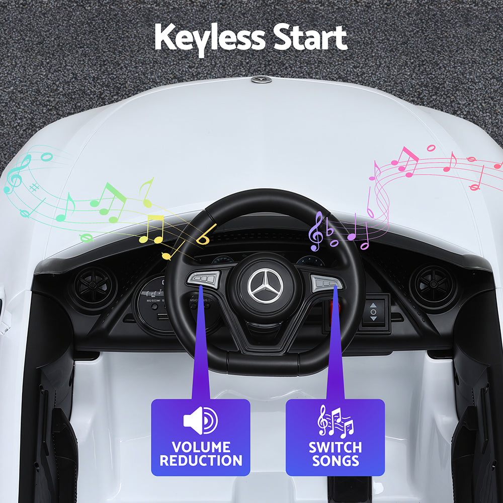 Car dashboard with steering wheel and keyless start feature highlighted, featuring volume reduction and switch songs options.