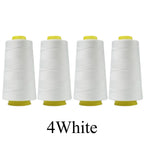 Four spools of white thread with yellow ends on a white background