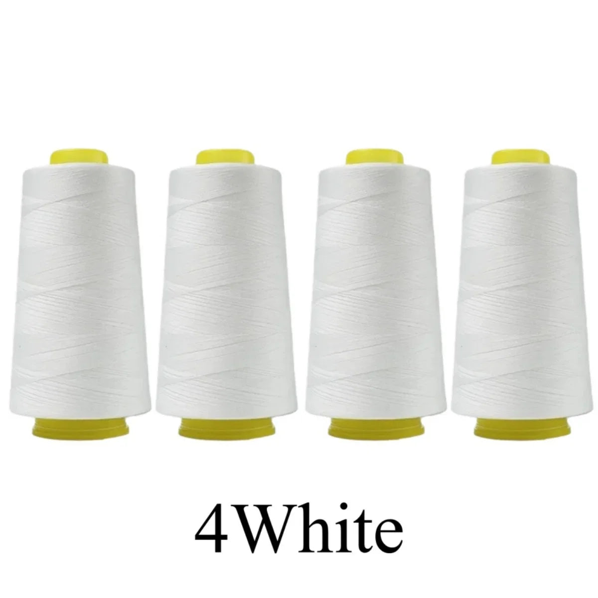 Four spools of white thread with yellow ends on a white background