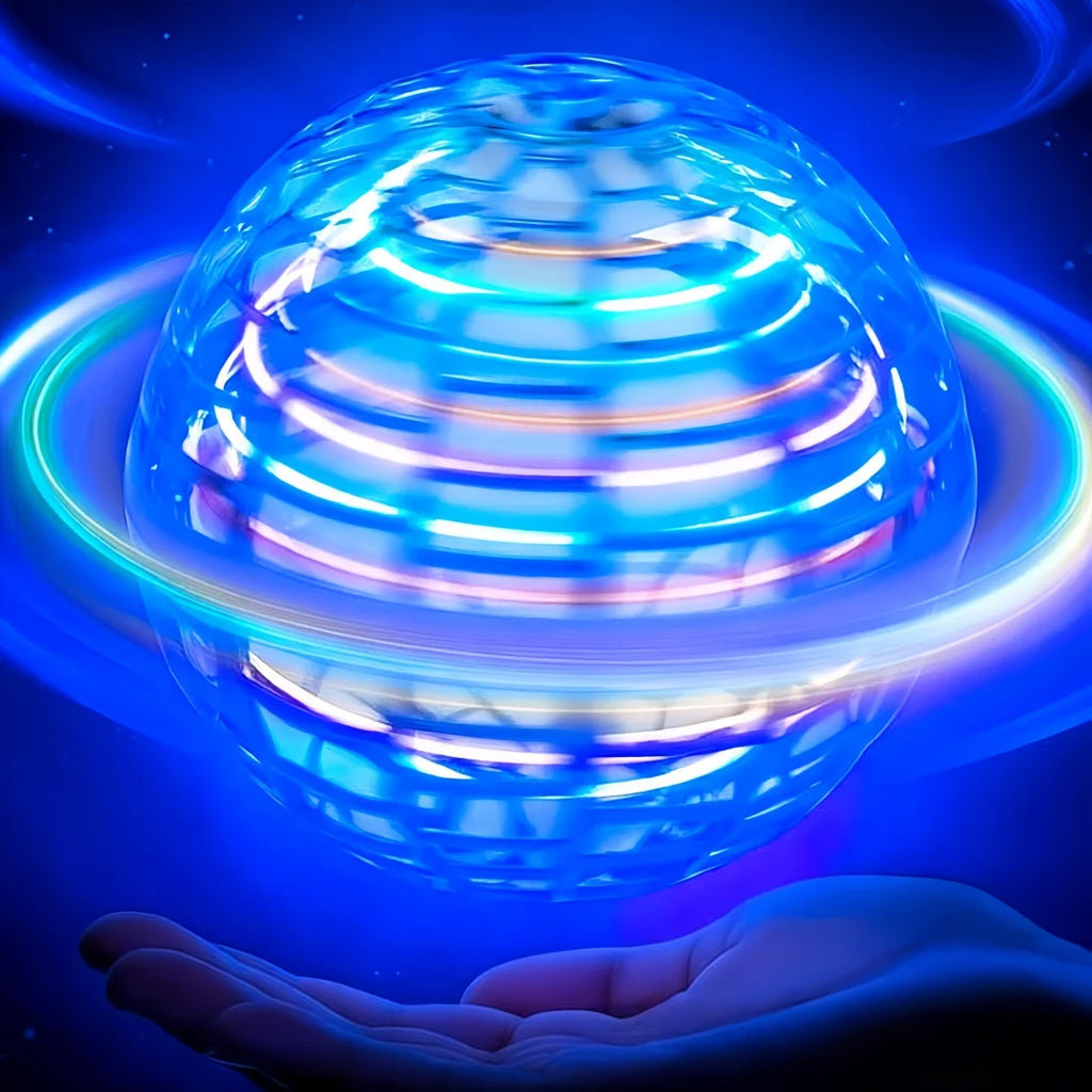 Transparent sphere with colorful light effects held in a hand against a dark background