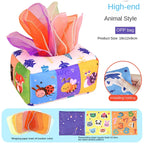 Colorful animal-themed gift bag with tissue paper and additional items on a white background