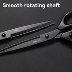 Black scissors with smooth rotating shaft on a dark background