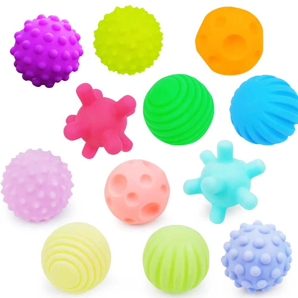 Assorted colorful textured balls on a white background