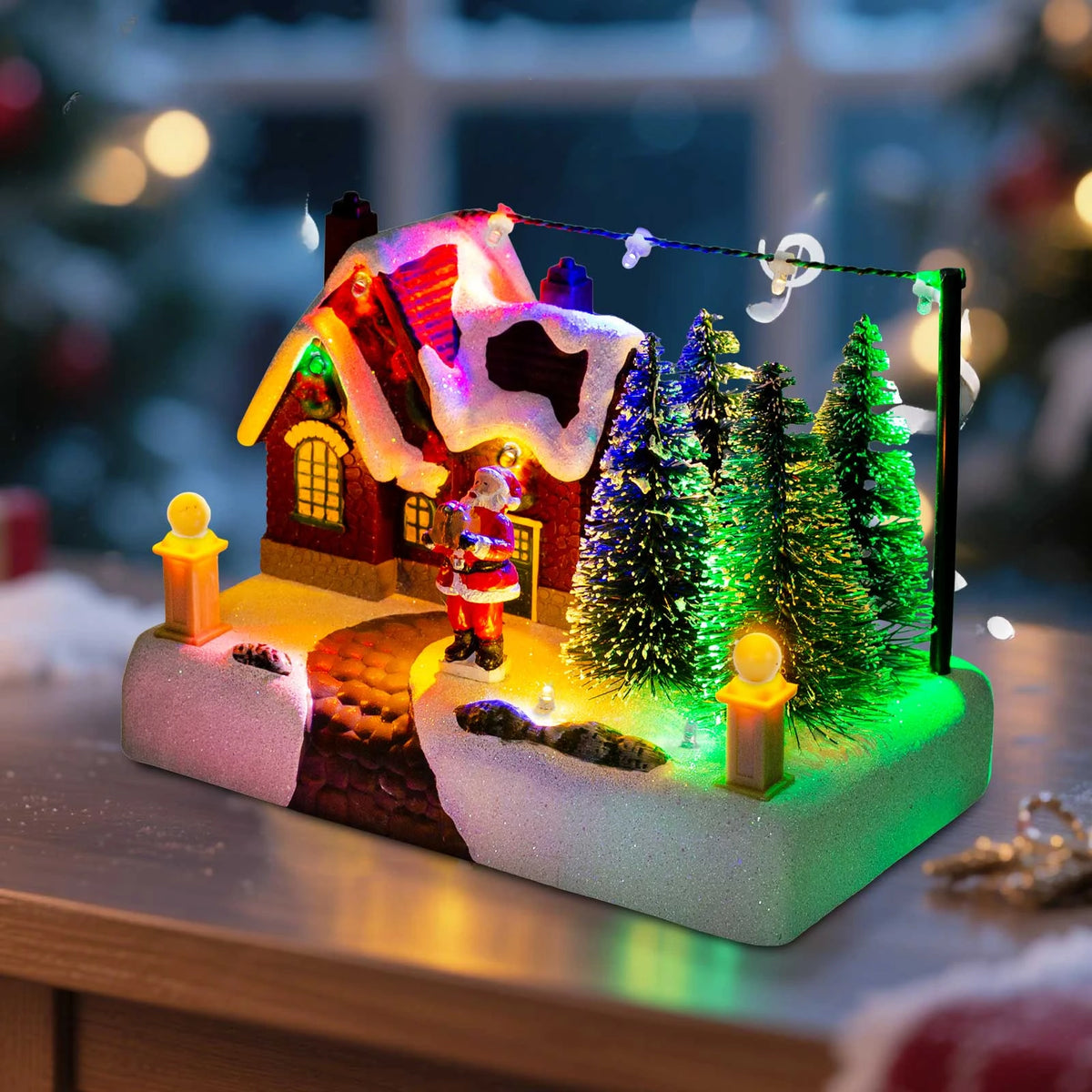 Decorative Christmas scene with a house, trees, and Santa Claus on a blurred festive background.