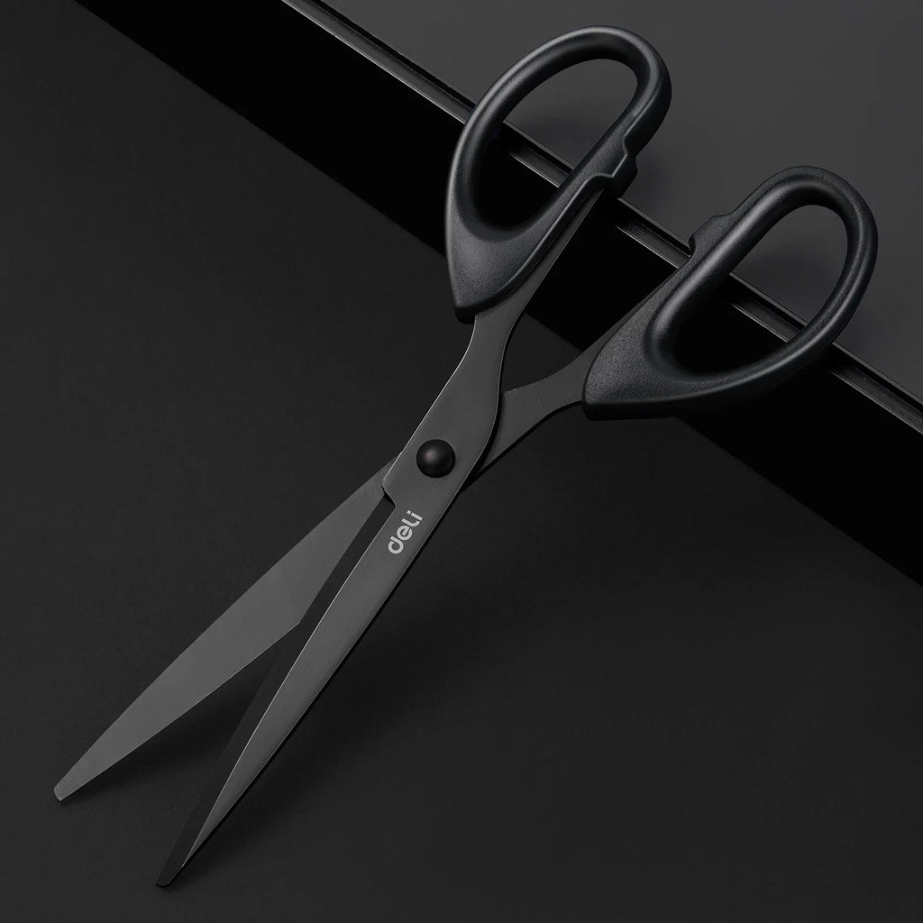 Black scissors with 'deli' branding on a black background