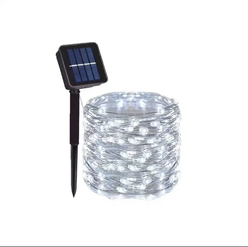 Solar-powered string lights with a solar panel on a white background