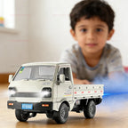 Toy truck on a table with a child in the background