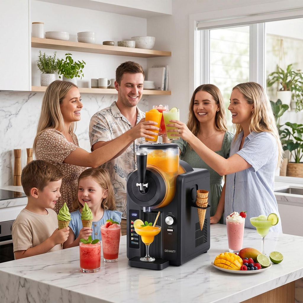 Family in a kitchen enjoying ice cream and drinks made with a blender.