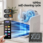A countertop self-cleaning appliance shown in a bright kitchen-like setting, with overlaid marketing graphics including '15Mins self-cleaning cycle,' a touch control panel, icons for 1 click and 15 minutes, and a small inset labeled 'Support dishwasher cleaning.' The product itself appears mostly white with transparent blue-tinted interior components and a small black control module.