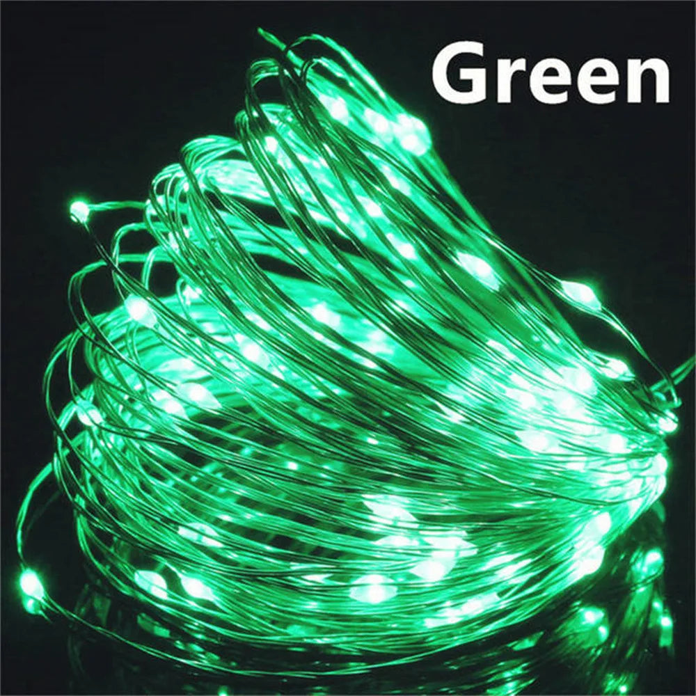 Green LED string lights coiled on a black background with 'Green' text above.