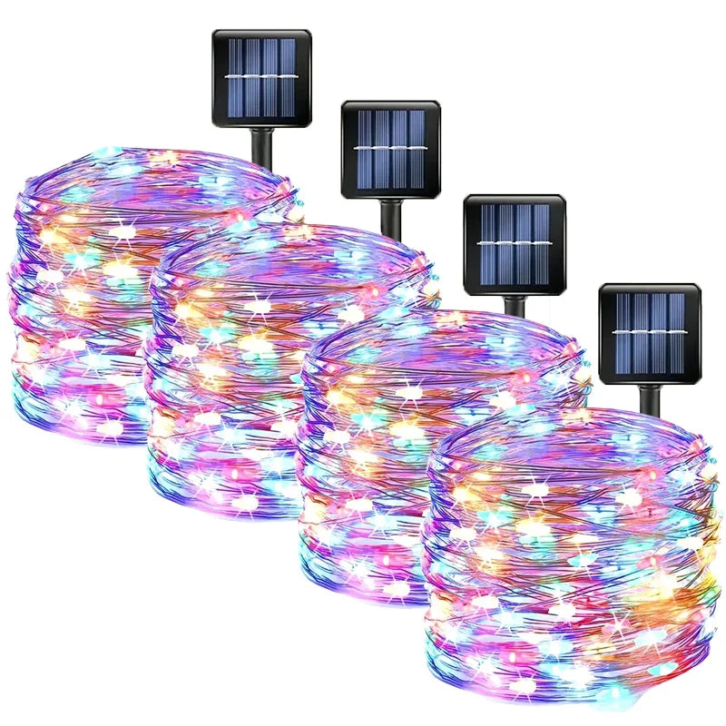 Set of solar-powered LED string lights with colorful bulbs on a white background