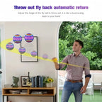 Man playing with a colorful fly ball toy in a room with greenery outside