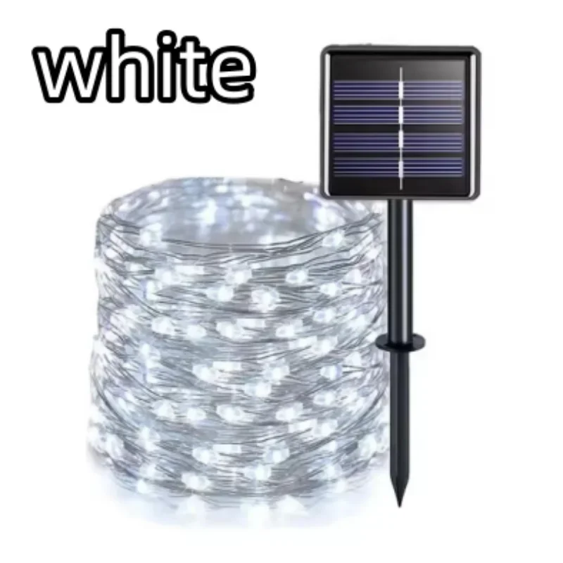 White solar garden string lights with a coiled wire and a small rectangular solar panel on a stake, shown on a white background with the word 'white' in the top left.