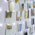 more cards on fairy light wall