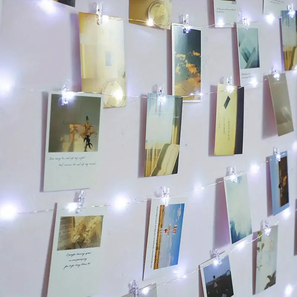 more cards on fairy light wall