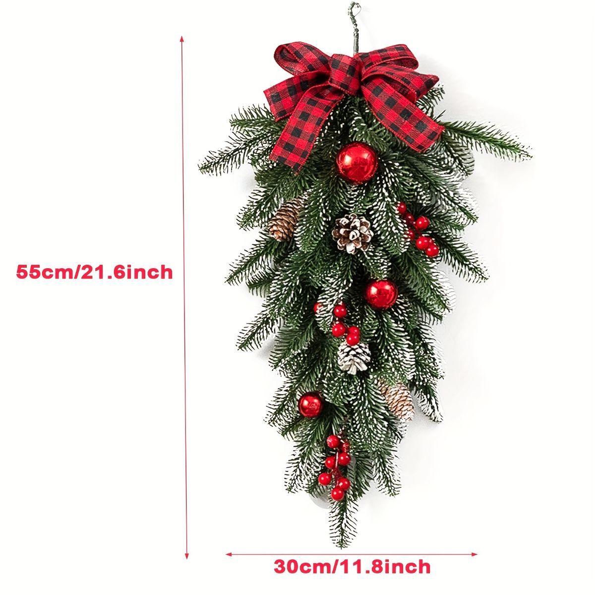 A hanging Christmas tree decoration with green pine branches, red ornaments, pinecones, and a red plaid bow, shown on a white background with red dimension lines indicating 55cm height and 30cm width.