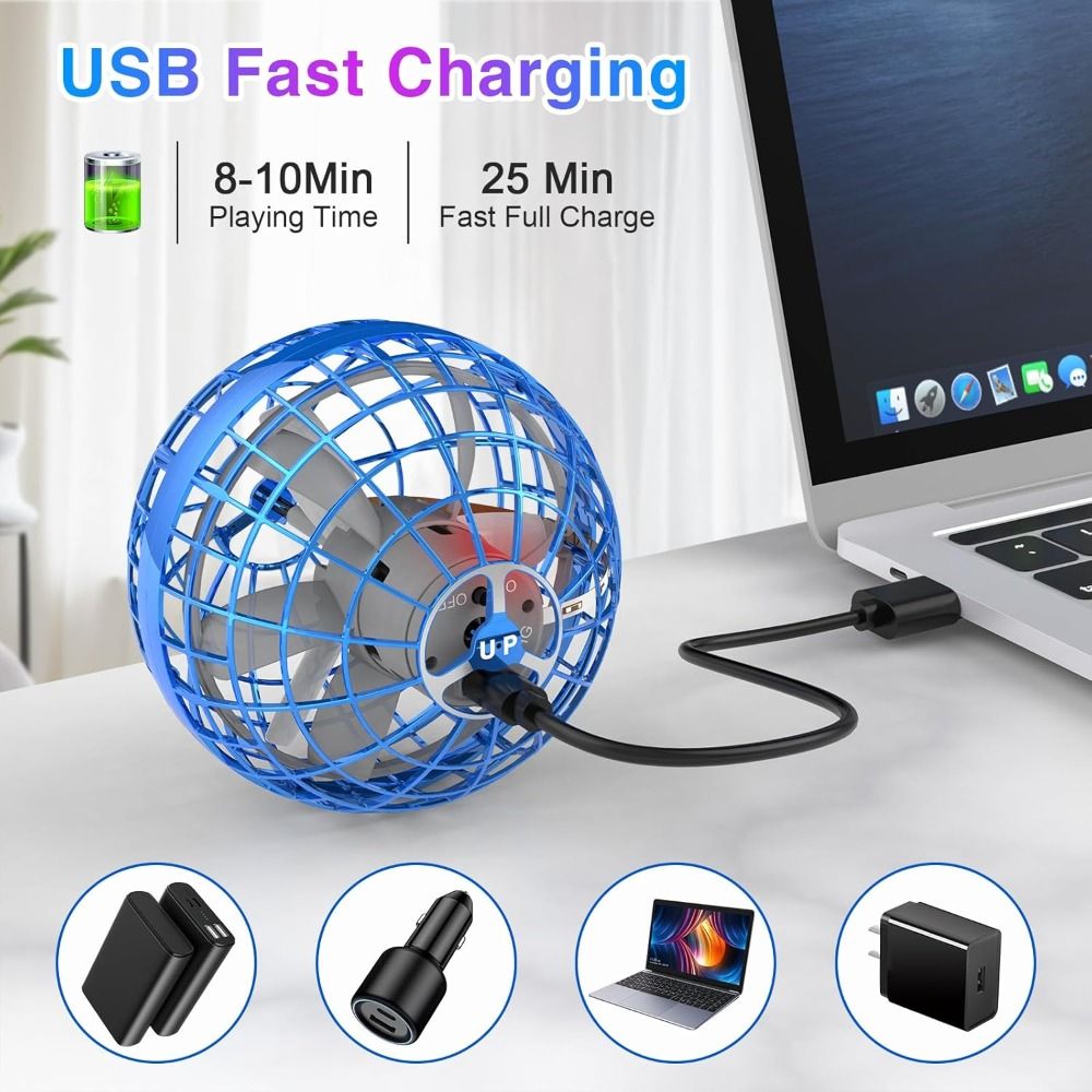 Blue and gray ball with USB cable connected to a laptop on a desk.