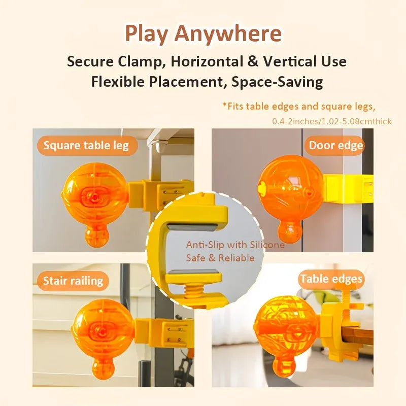 An orange translucent suction cup mounting accessory shown in multiple usage examples on a beige background, with text reading 'Play Anywhere' and labels for square table leg, door edge, stair railing, and table edges