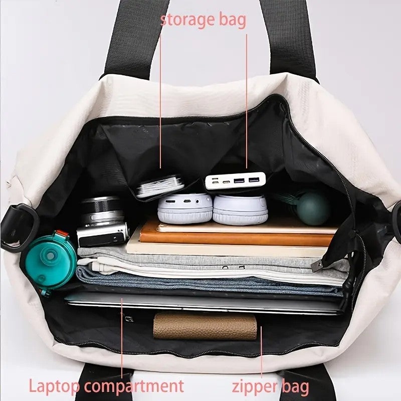 White tote bag with compartments labeled, containing electronic devices and books.