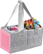 Gray and pink storage caddy with handles filled with colorful items on a white background
