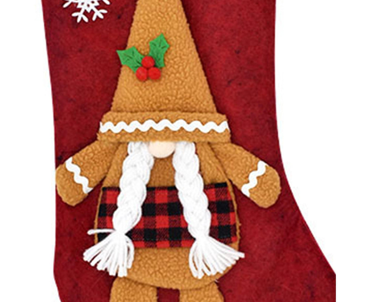 Christmas gnome decoration on a red background
