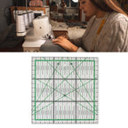 A sewing ruler with a clear acrylic base, green measurement grid lines, and black markings, shown below a lifestyle photo of a woman sewing with a sewing machine.

Details