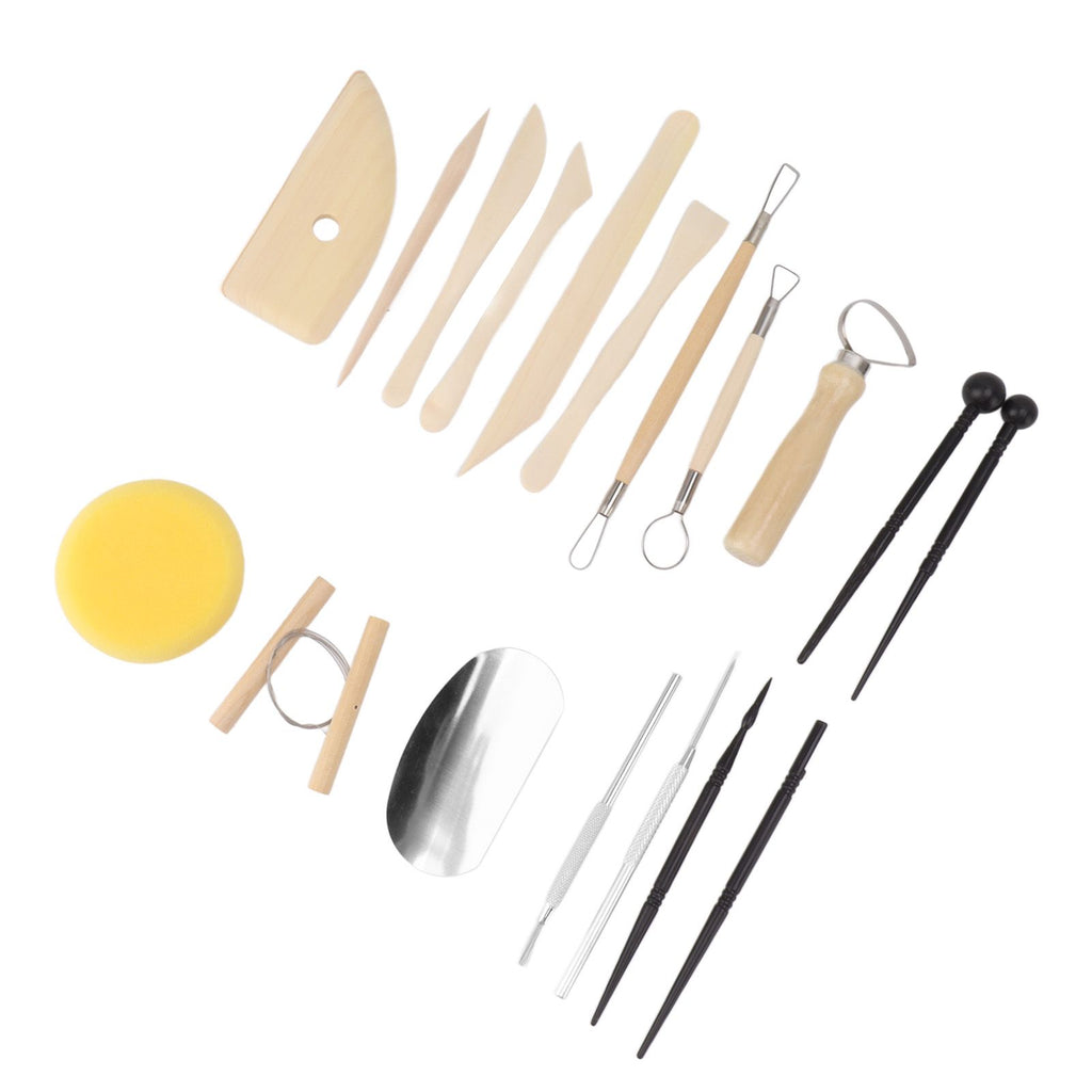 A pottery wheel throwing tool set arranged on a white background, including wooden sculpting knives, metal loops, black-handled tools, a yellow sponge, and a polished metal spatula.