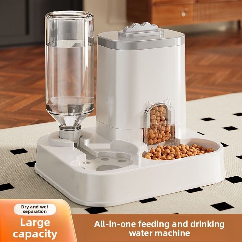 All-in-one feeding and drinking water machine for pets on a tiled floor.