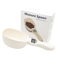 Digital measuring spoon with a digital display and packaging on a white background