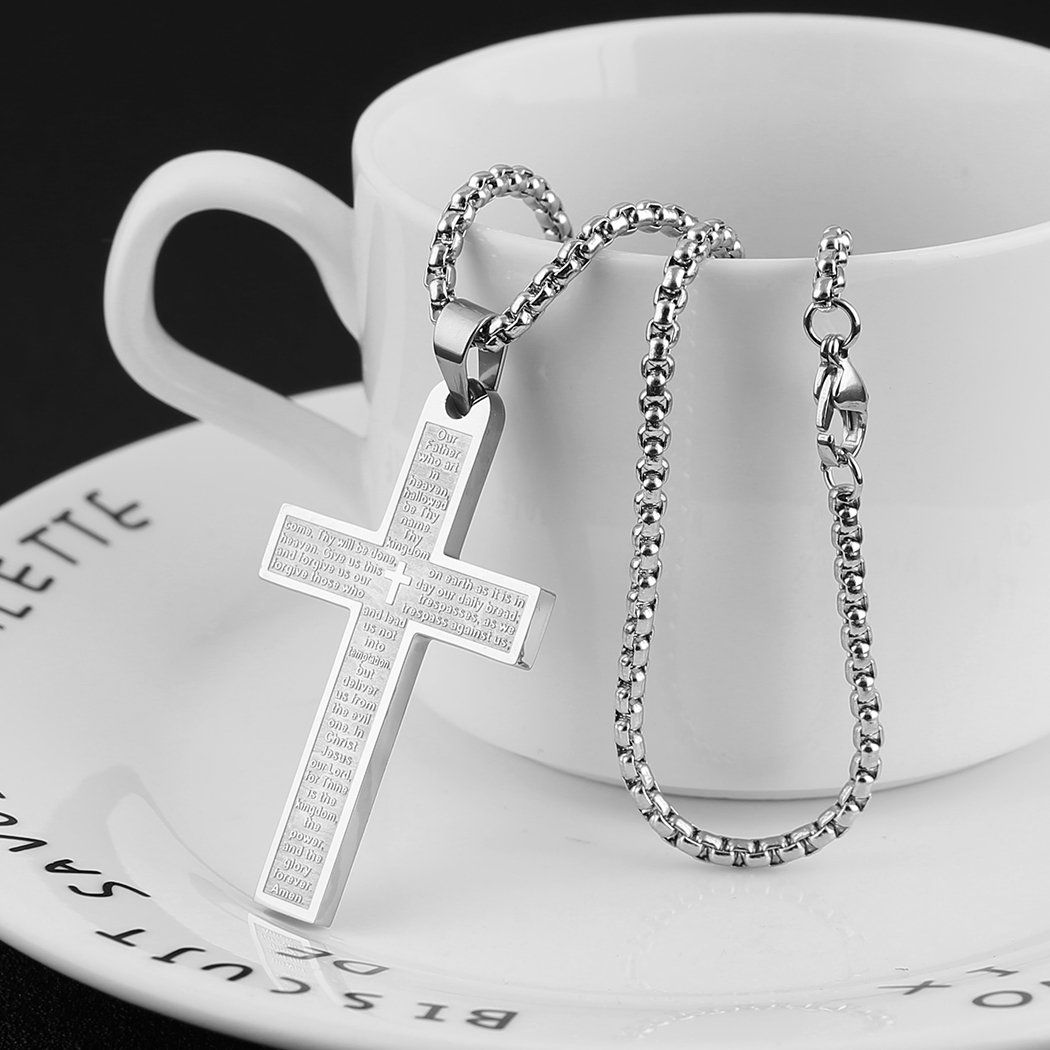 The Holy cross eck lace sitting in a tea cup