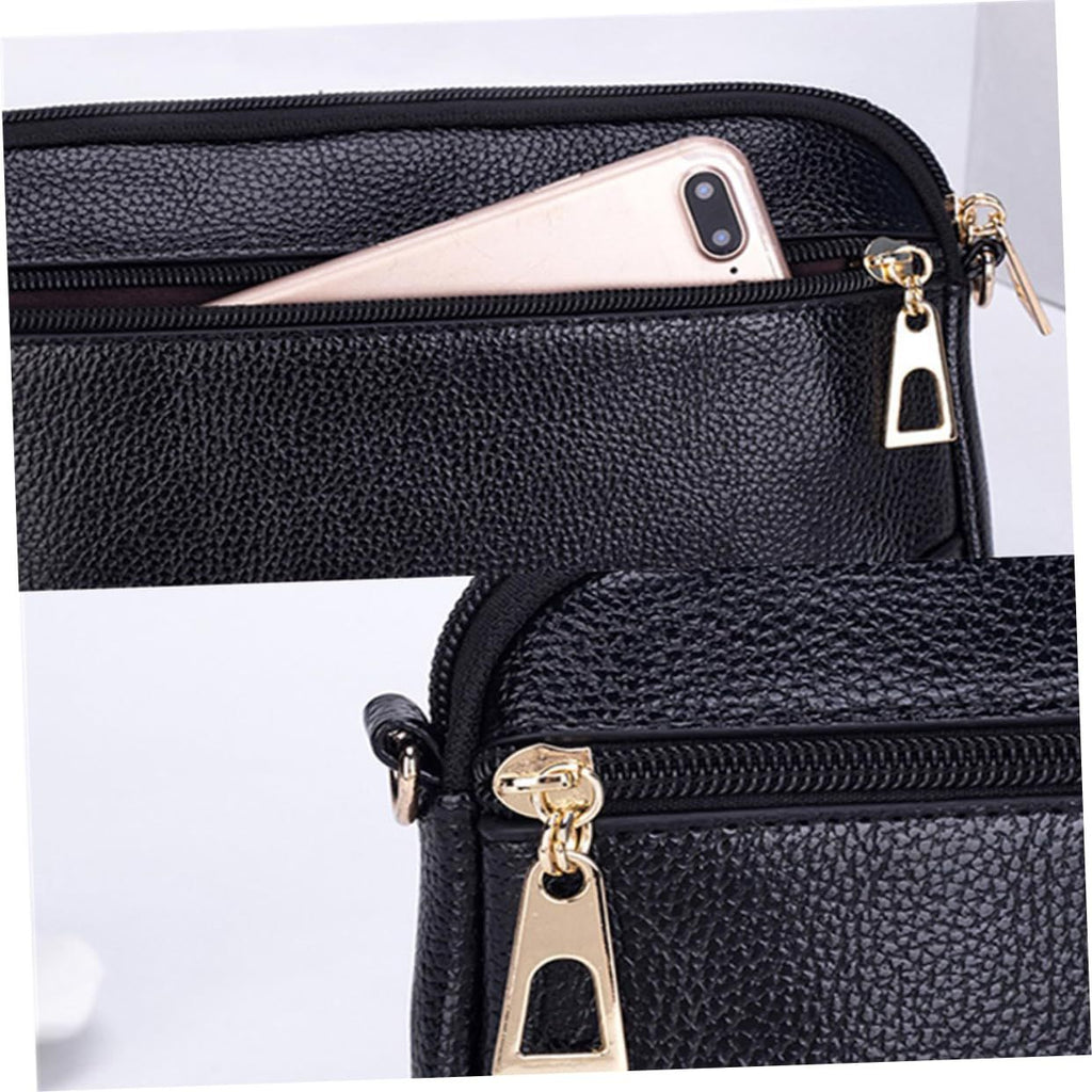 Black pebbled leather crossbody phone pouch with gold-tone hardware, shown in two views: one with a smartphone tucked into the zippered compartment, and a close-up of the zipper pull.