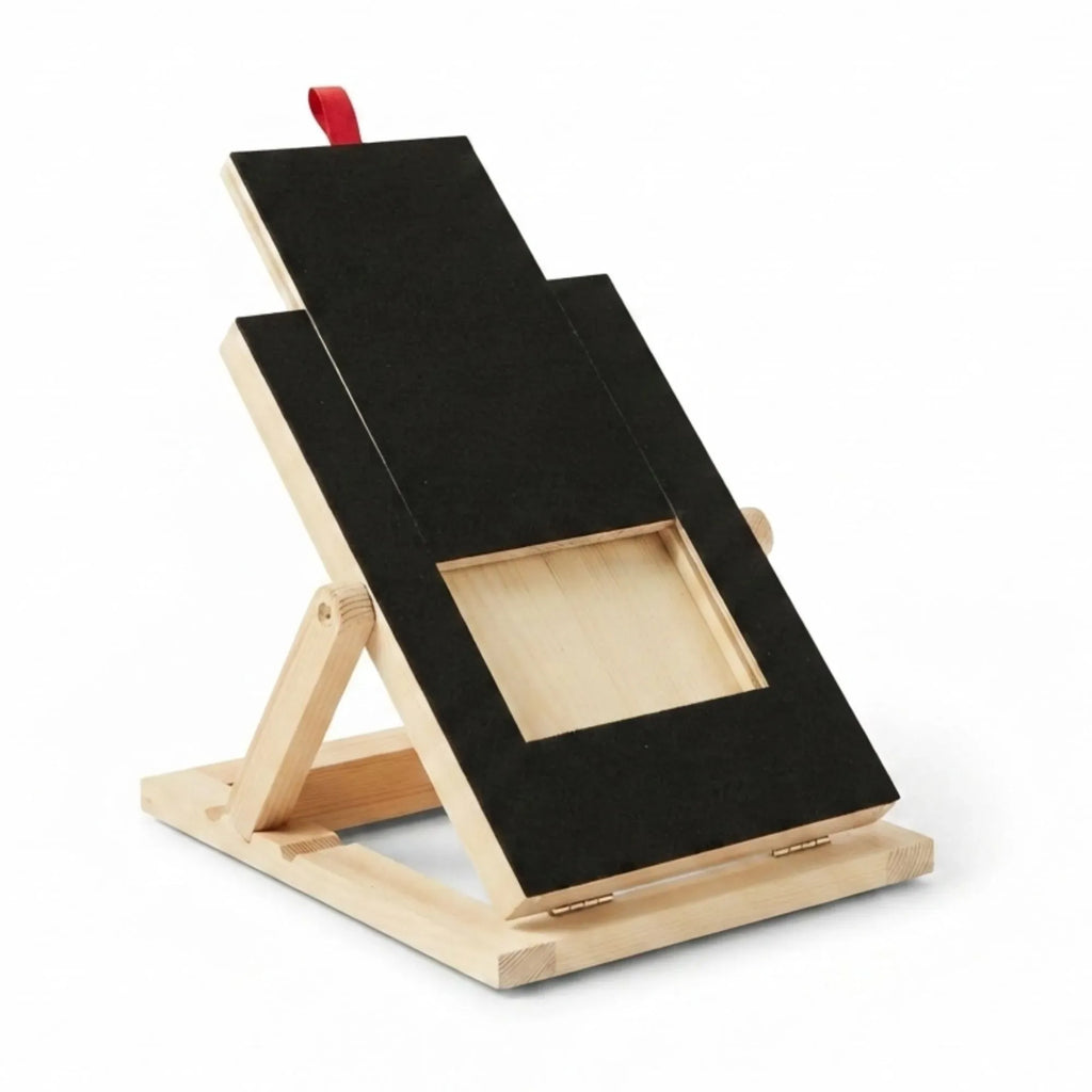 A wooden picture frame stand with a natural light wood base and legs, featuring two angled black panels that form the frame, with a small red hanging loop at the top, shown on a white background.