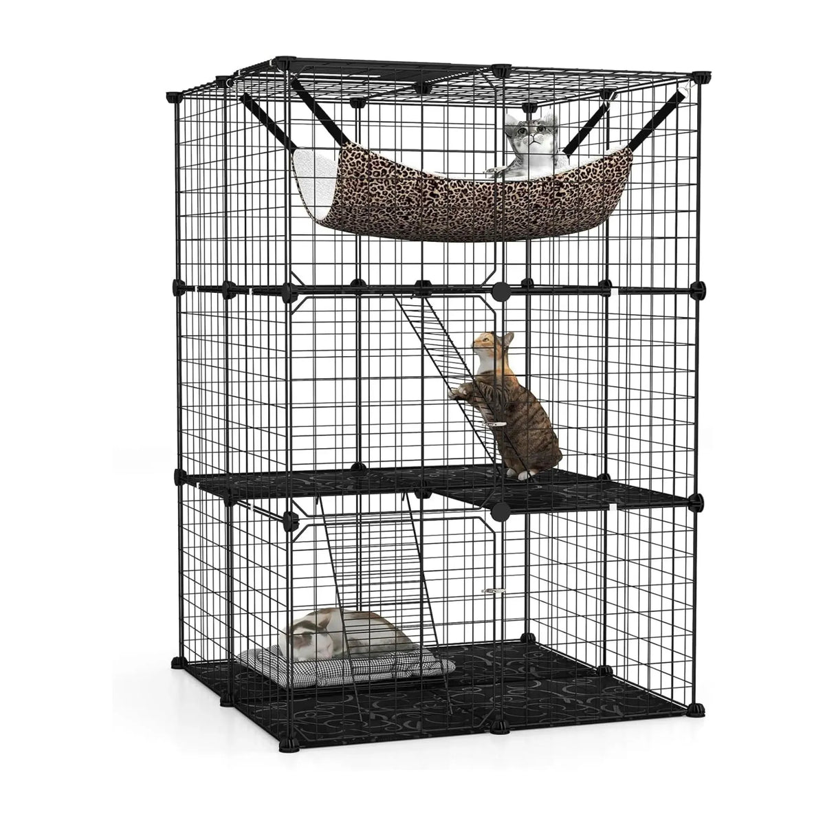 A three-tier black wire cat cage with accessories including a leopard-print hammock, a small ladder, a scratching pad, and a bed, shown with three cats inside on a white background.