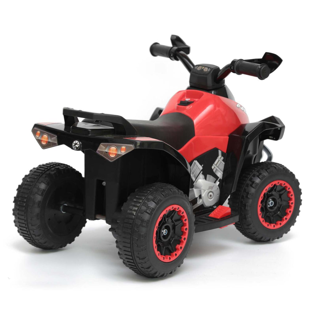 Red and black toy ATV on a white background