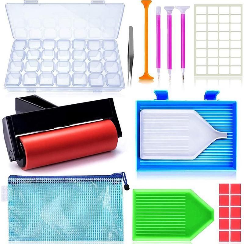 Collection of various tools and equipment including a clear plastic tray, brushes, and other items on a white background.