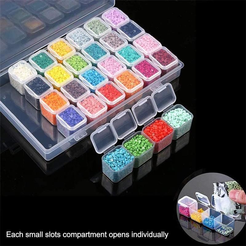 Clear plastic organizer with small compartments filled with colorful beads on a black background.